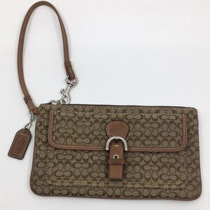 Coach Signature Wristlet Coach With silver tone front magnetic snap slip pocket